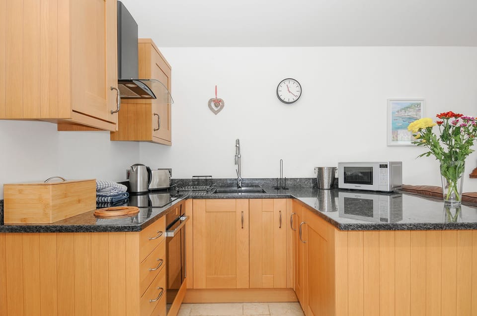 Fridge, electric kettle, toaster, cookware/dishes/utensils