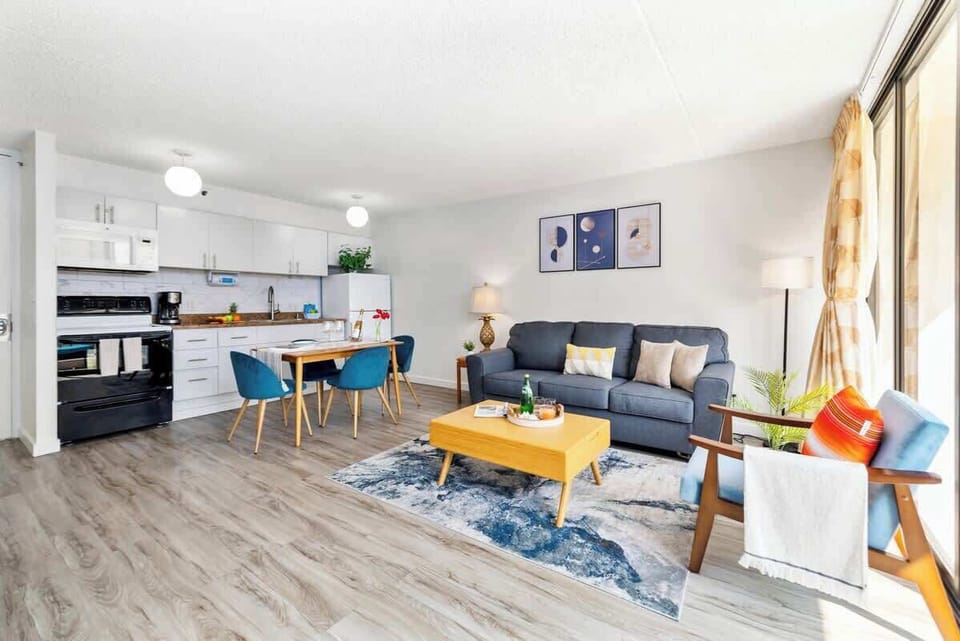 Overview of the room, kitchen, and dining area.