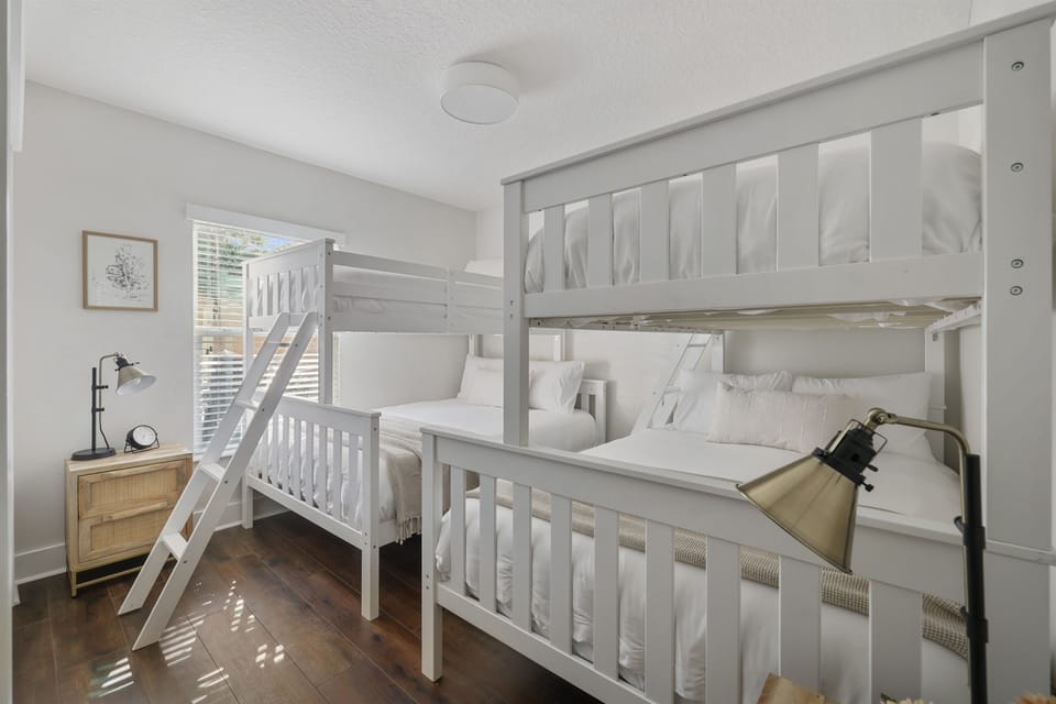 Guest bedroom #3 featuring two twin-over-full bunk beds.  Plenty of sleeping space for families or larger groups.