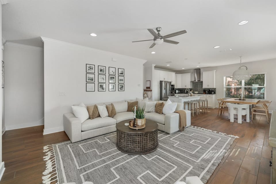 Bright open living space perfect for relaxing after a day at the beach.
Comfortable seating and an open layout designed for gathering.