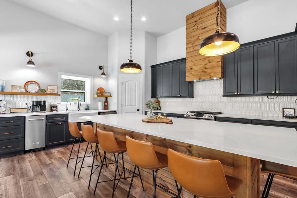 Modern kitchen with bar seating.