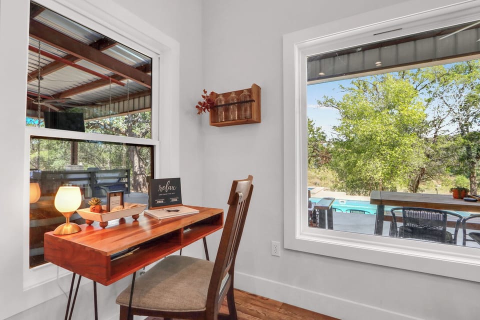 Also tucked away in the dining area is a writing desk.