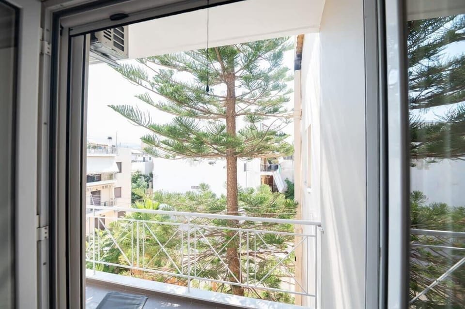 Bedroom 1: Large Window with Scenic Views of the Outdoors – Bringing the beauty of nature into your room.