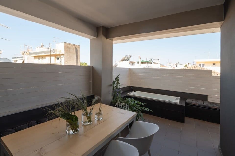 Exterior Seating Area with Covered Patio and Stylish Views – A perfect outdoor lounge for relaxing moments.