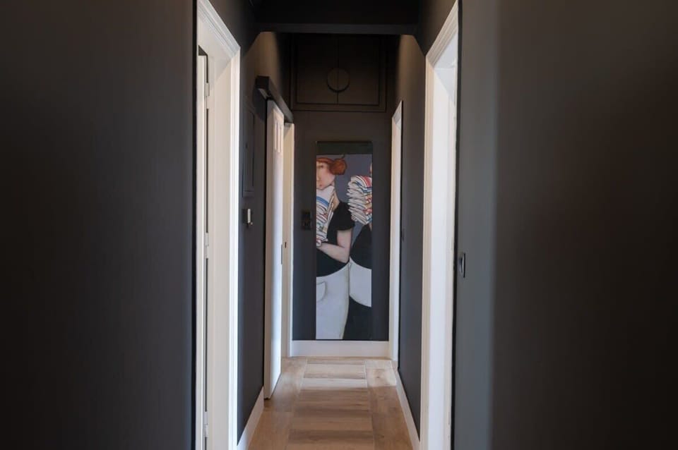 Hallway Area with Modern Lines and Soft Lighting – A smooth transition between the home’s spaces.