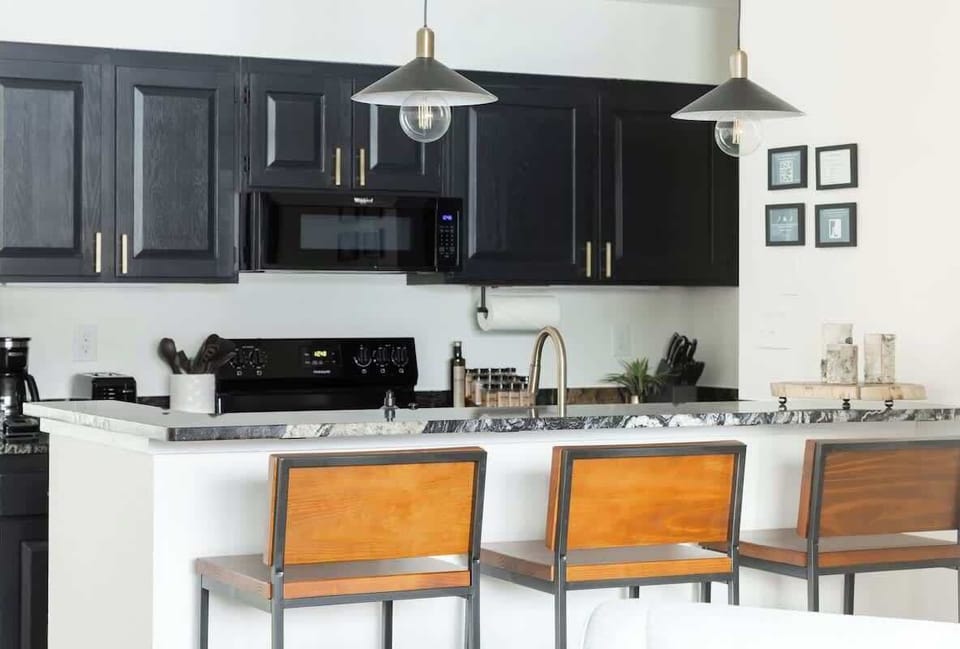 Two barstools at the kitchen counter