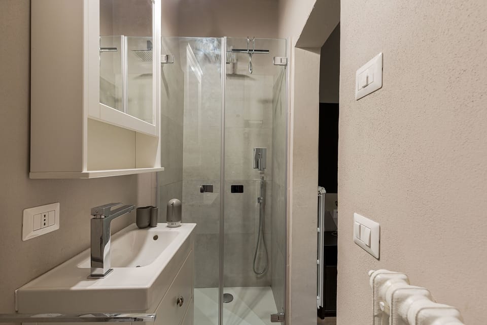 City Studio | Bathroom | Shower, rainfall showerhead, hair dryer, bidet