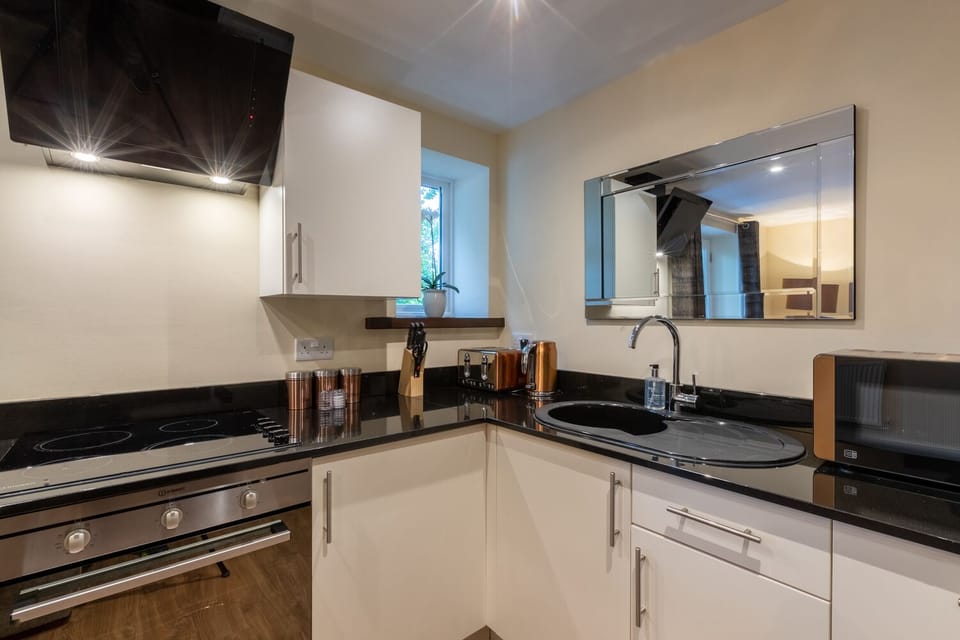 Two Bedroom First Floor Apartment on Two Levels (DUPLEX) | Private kitchen | Coffee/tea maker, electric kettle