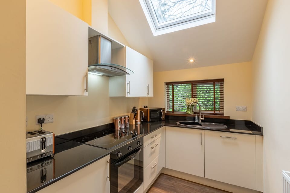 Two Bedroom First Floor Apartment on Two Levels (DUPLEX) | Private kitchen | Coffee/tea maker, electric kettle