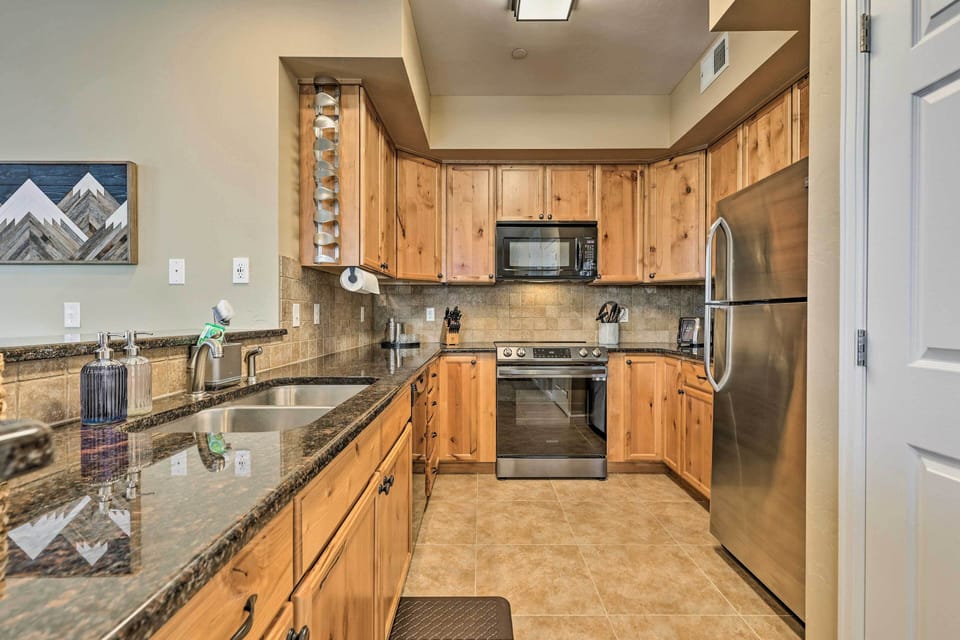 Kitchen | Pet Friendly w/ Fee | Gas Fireplace | Mountain & Wooded Views