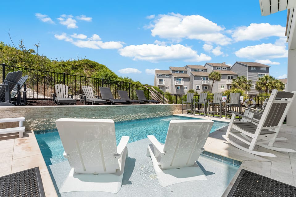 Sink into the shallow pool loungers and let the warm water embrace you while soaking up the sun's rays.