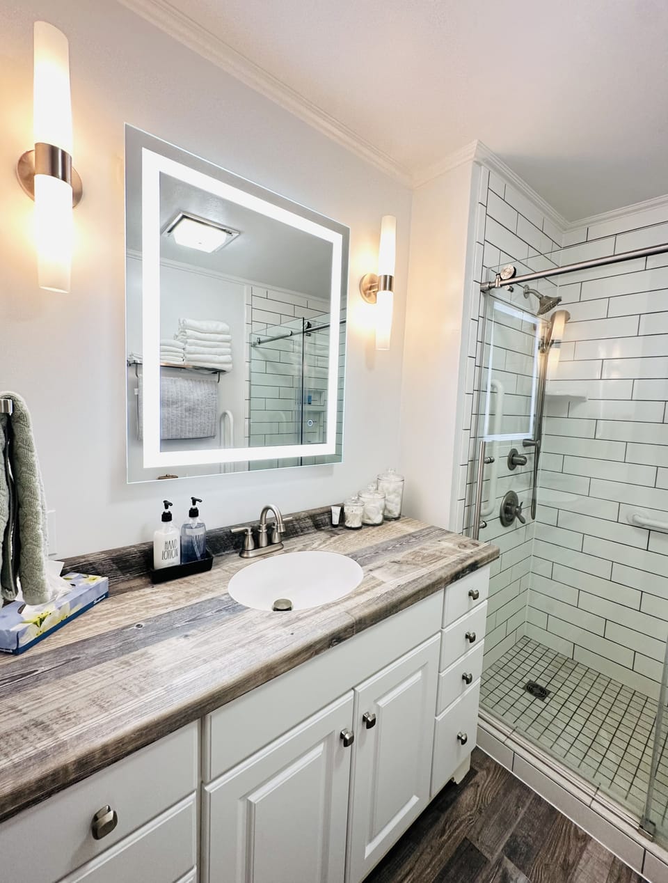 Bathroom #1 - spacious and well lit with lots of counter space and vanity light!