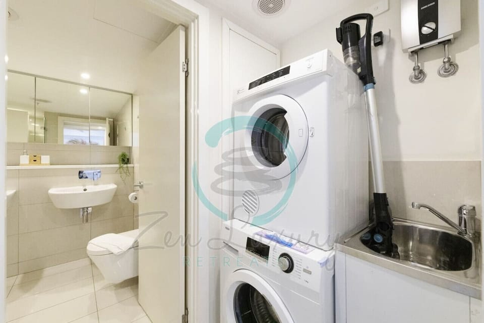 ZEN OCEAN BLISS - Cozy 2-BR/2-BA Sea View Retreat - Experience the epitome of convenience in our fully equipped laundry haven.