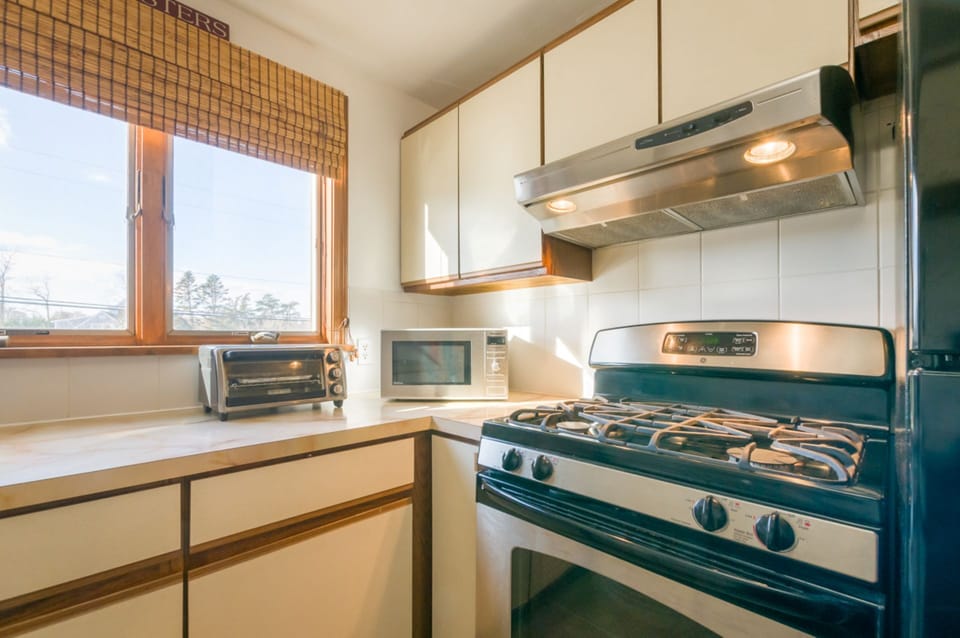 Kitchen with toaster oven and gas stove- 72 Town Neck Road Town Neck Beach Escape