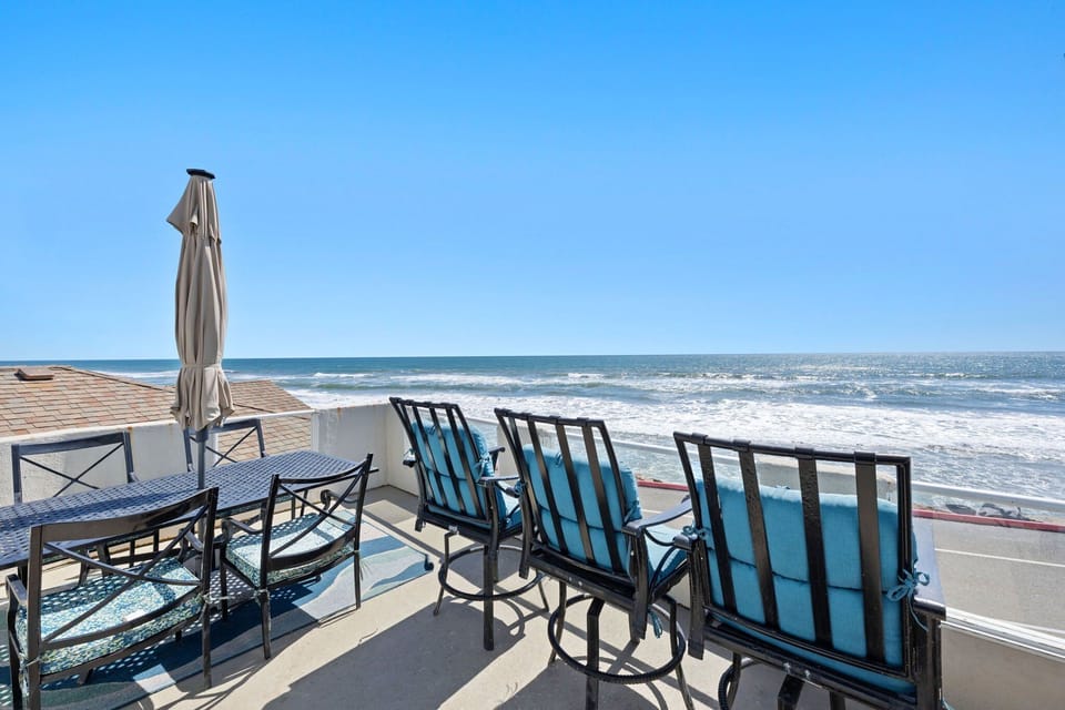 Beachfront patio with sweeping coastal views