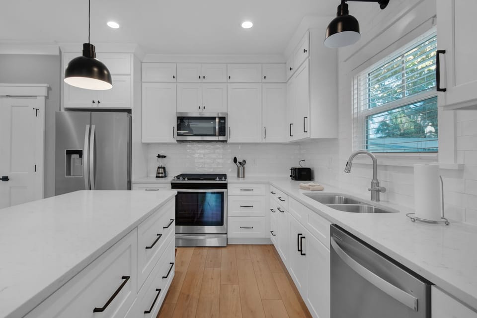 Fully stocked gourmet kitchen with storage galore.
