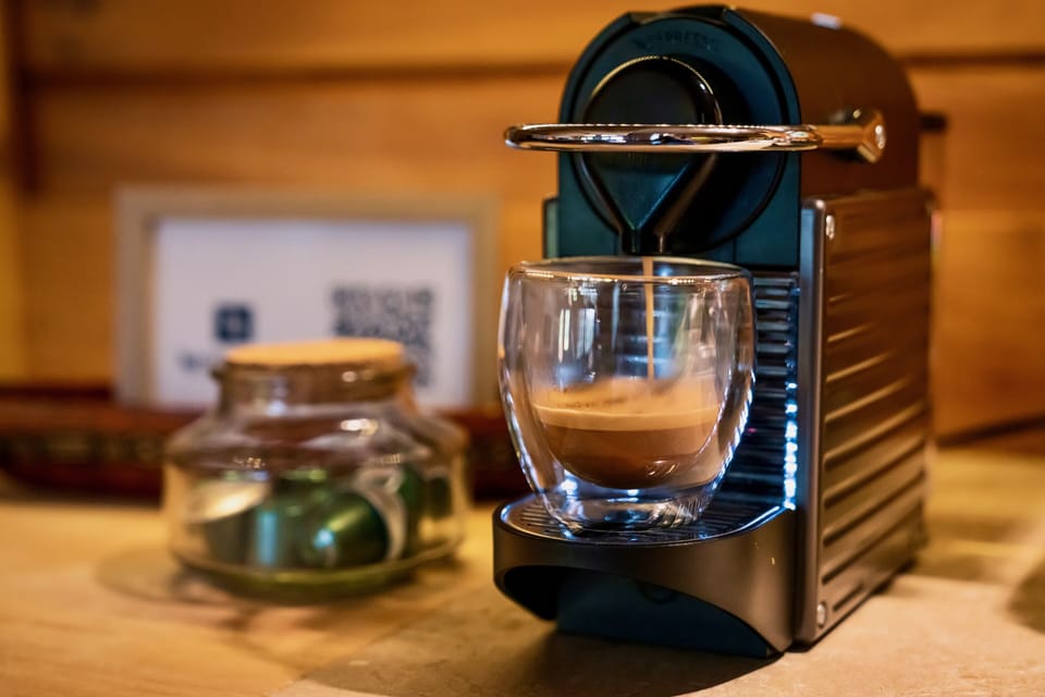Nespresso Pixie Coffee machine + Aeroccino. Bodum Glasses. Pods provided!