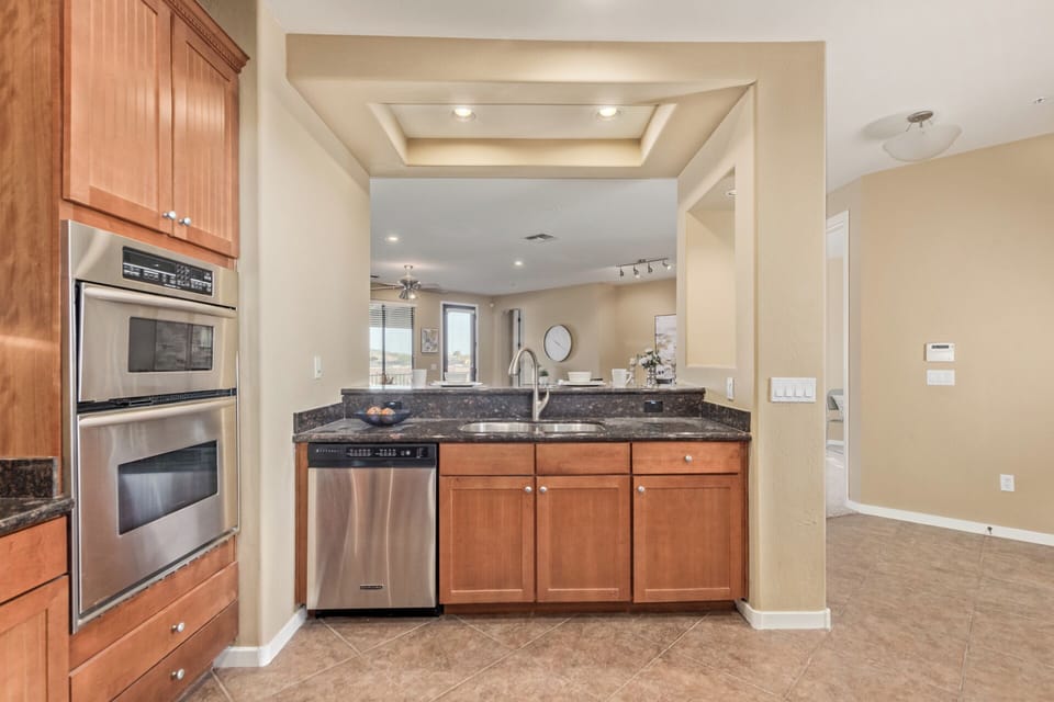 Kitchen overlooking living and dining rooms