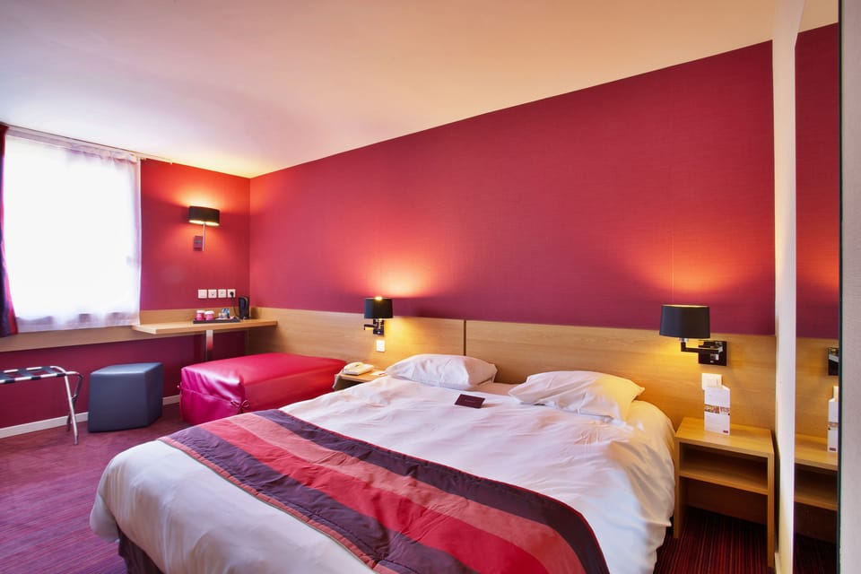 Premium bedding, desk, blackout drapes, soundproofing