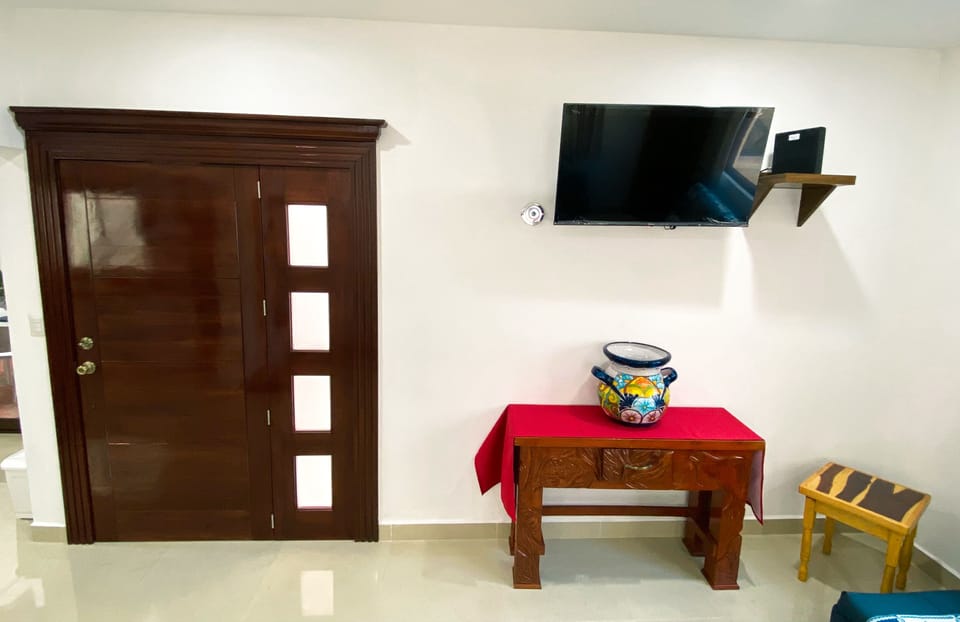 40-inch flat-screen TV with cable channels, TV