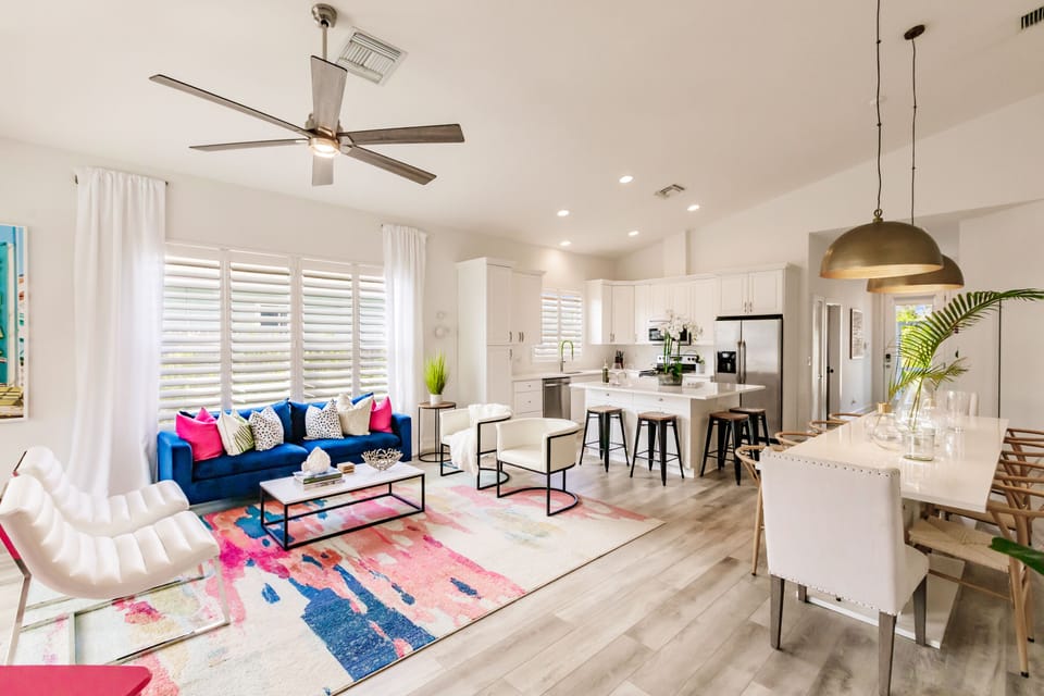 Large living room with plenty of seating for everyone gather. 