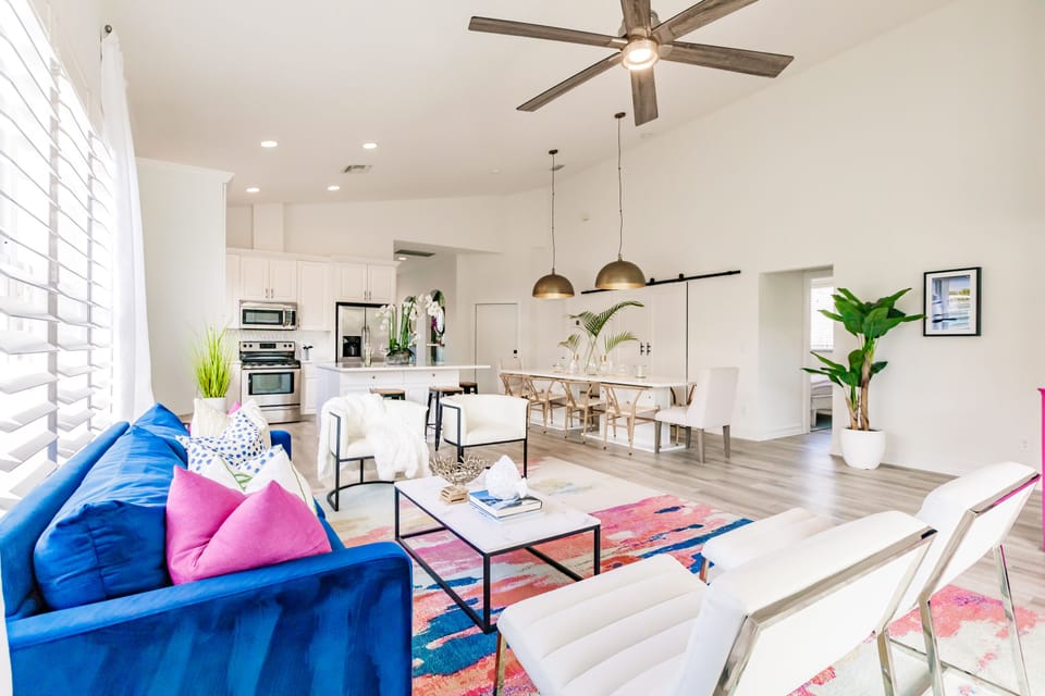 Large living room with plenty of seating for everyone gather. 