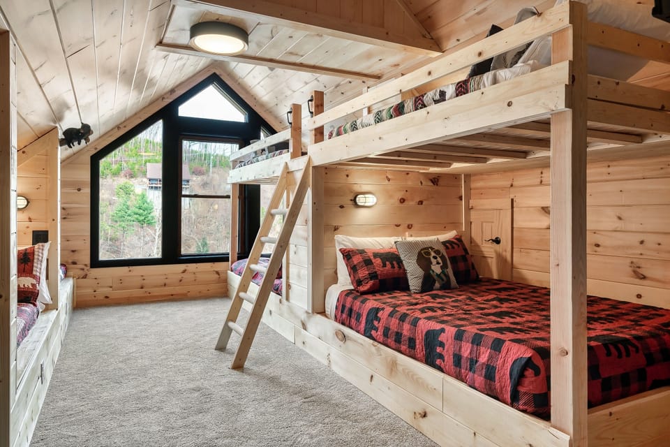 Custom bunk room sleeps up to 10-every bed has its own dimmable light & storage