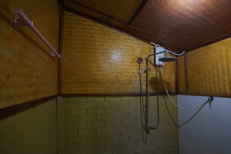 Beachside Twin | Bathroom | Shower, rainfall showerhead, hair dryer, towels