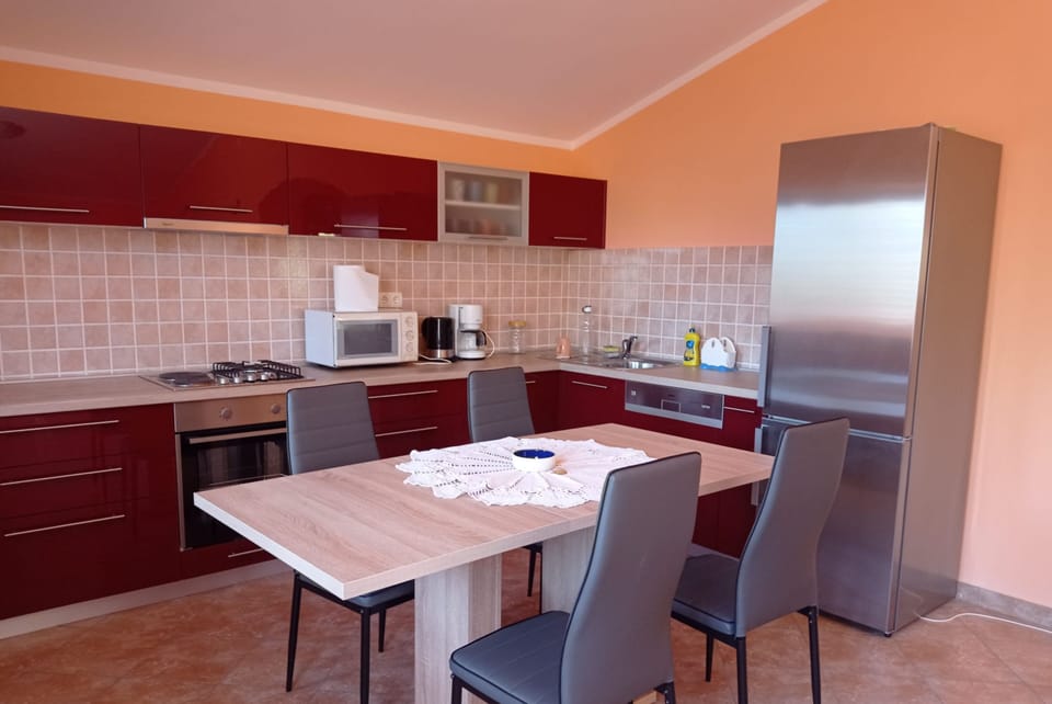 Family Apartment, 2 Bedrooms, Terrace, Courtyard View | In-room dining
