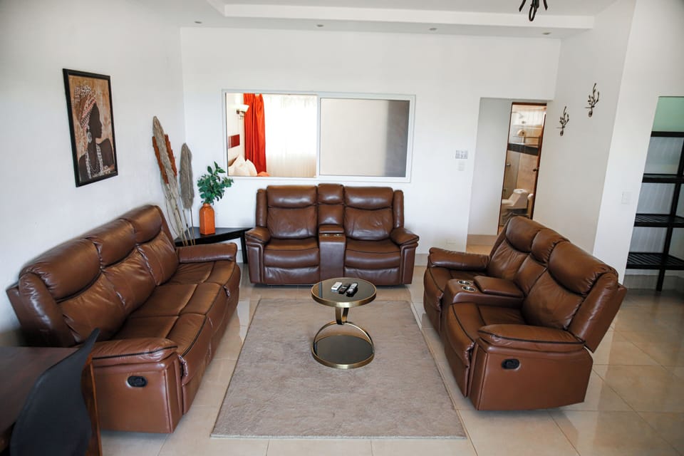 Deluxe Studio Suite | In-room safe, desk, laptop workspace, blackout drapes