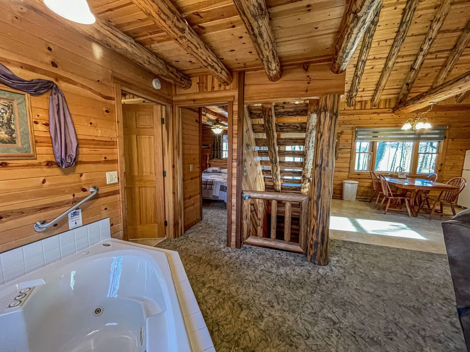 Whirlpool tub, bathroom door, bedroom door.