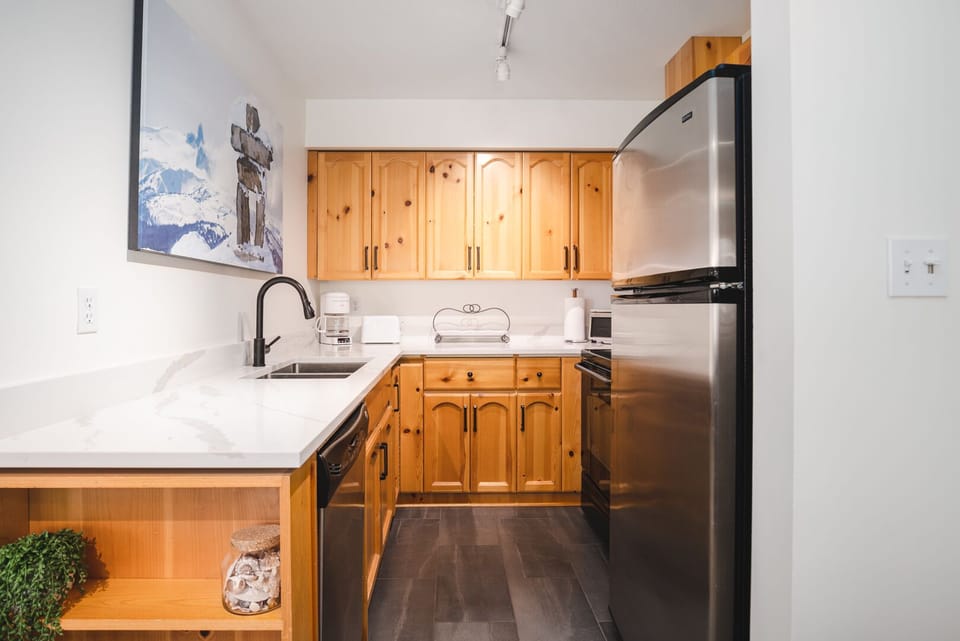 New quartz counters and stainless appliances