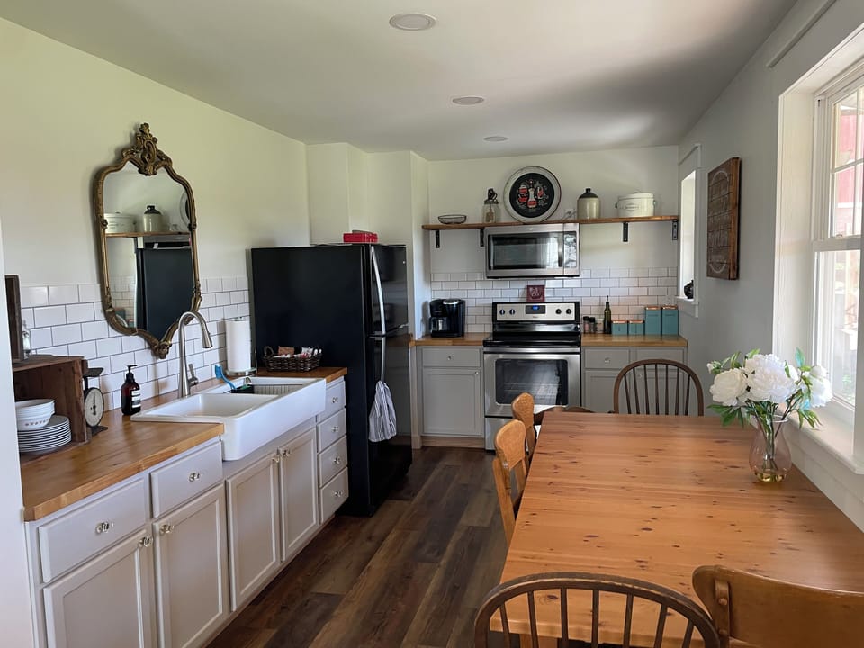 Walk in the front door and kitchen is to the right