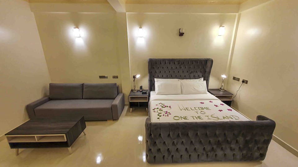 Deluxe Room, 1 King Bed with Sofa bed | In-room safe, blackout drapes, iron/ironing board, free WiFi