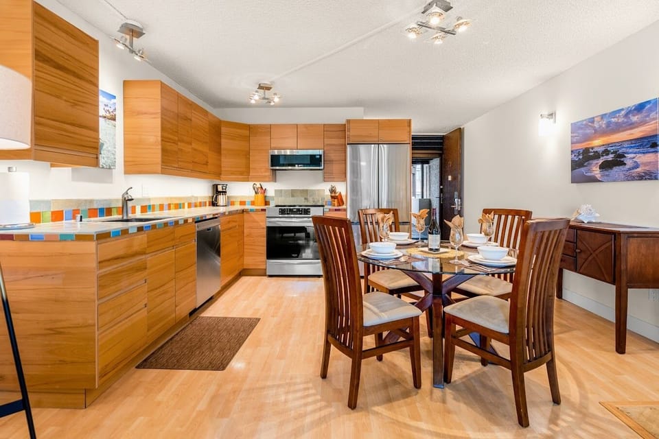 Kitchen and Dining area perfect for eating in. Plenty of room for everyone to feel comfortable and enjoy a meal.
