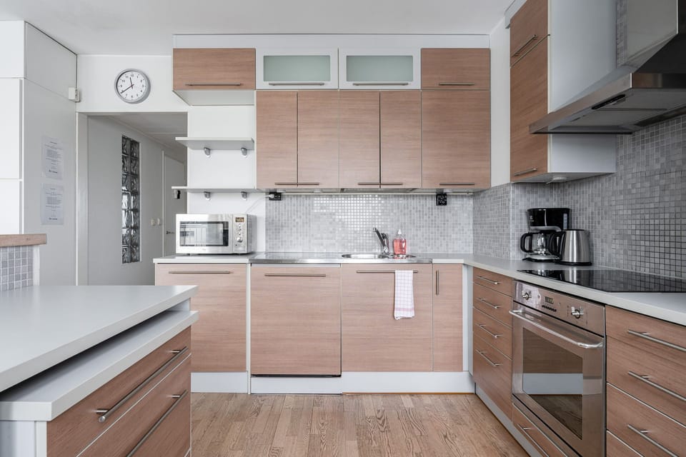 Exclusive Apartment | Private kitchen | Full-size fridge, microwave, oven, stovetop