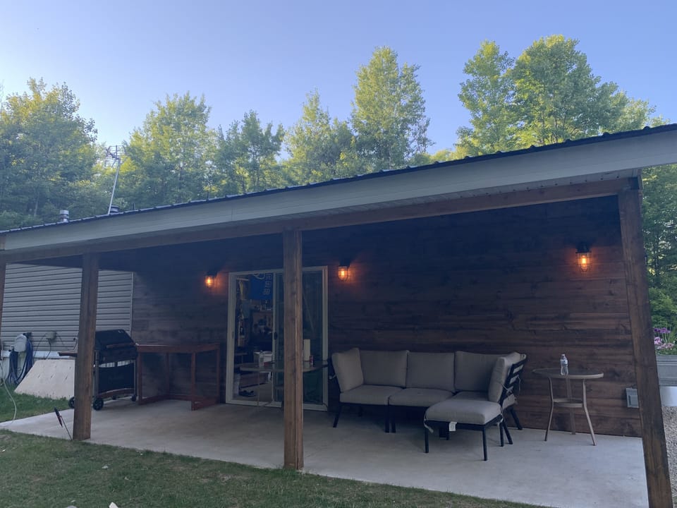 Patio on the side of garage/back yard.