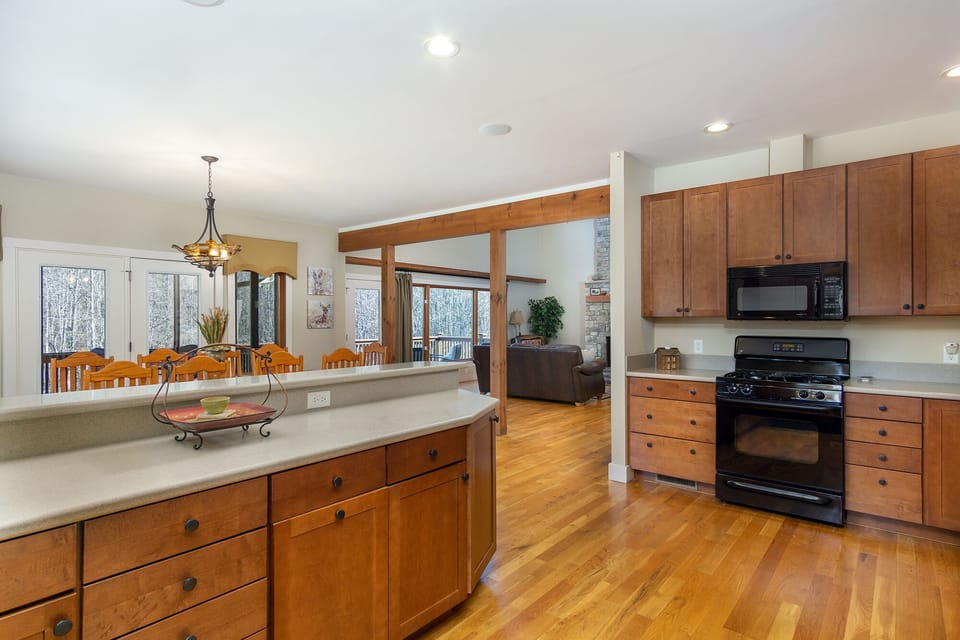 Kitchen with ample counter space, dishwasher & Keurig coffeemaker.
