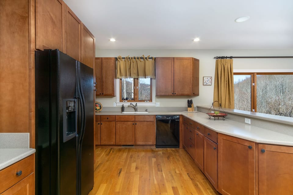 The kitchen offers ample counter space along with a dishwasher & Keurig coffeemaker.