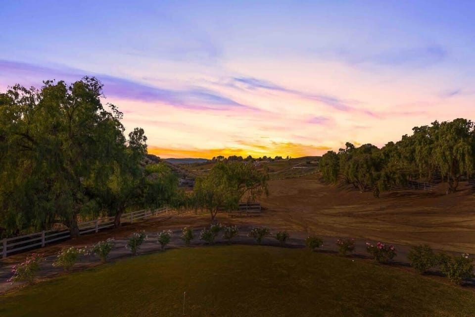 End your day with this breathtaking sunset view from the backyard.