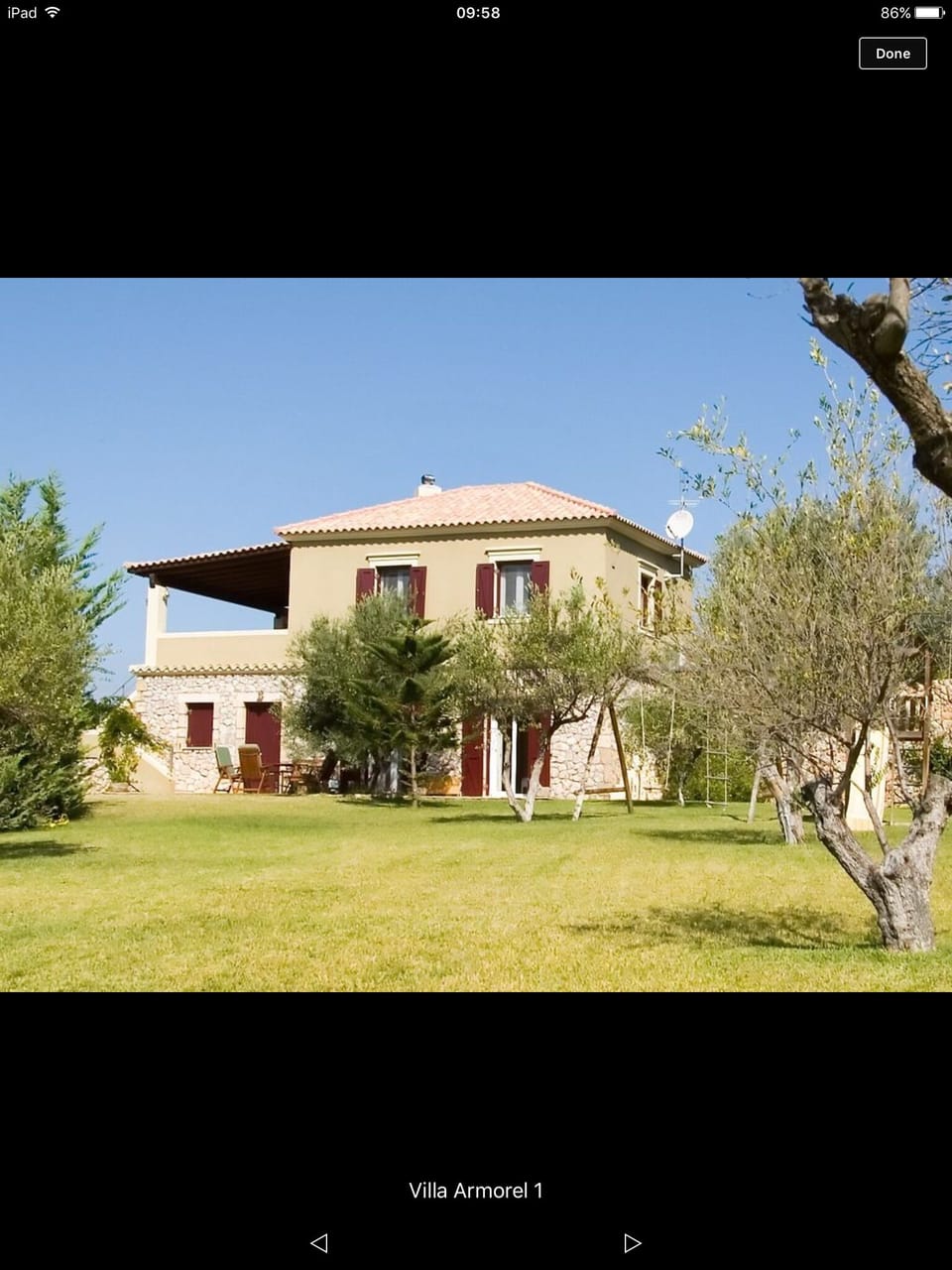 View of villa from garden and upper veranda facing fabulous sea view!  