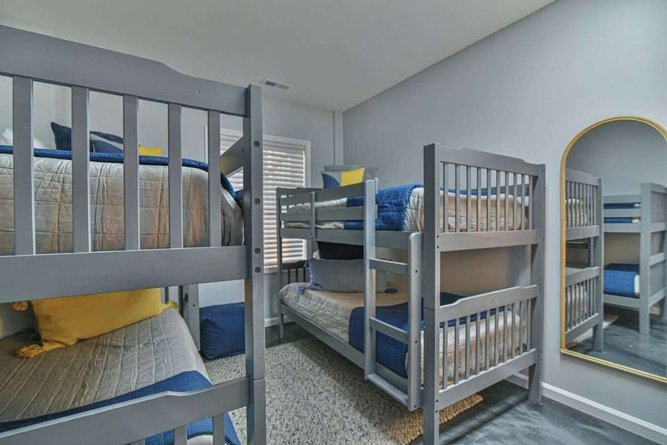 2 sets of bunk beds, full mirror, and 43" HDTV