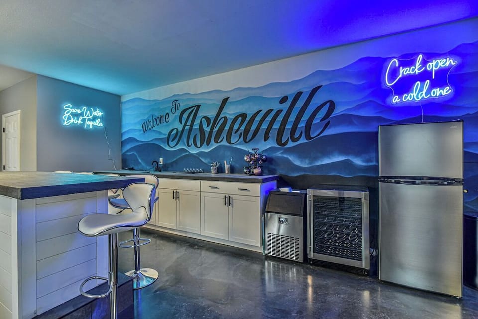 Full bar area - sink, ice maker, cooler, and refrigerator