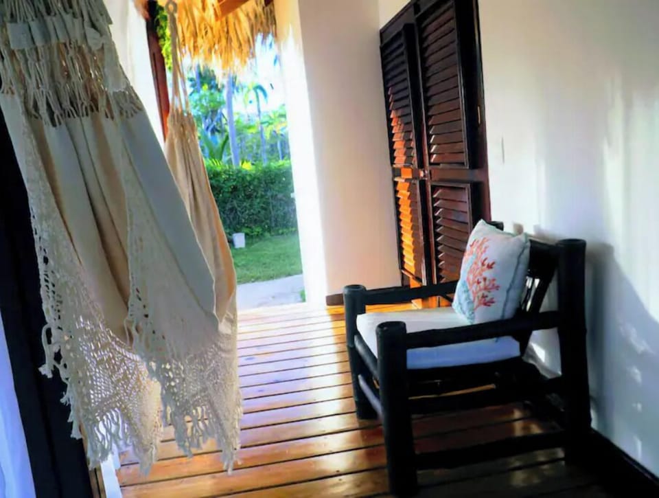 Side Patio with Doors Leading to Main Bedroom