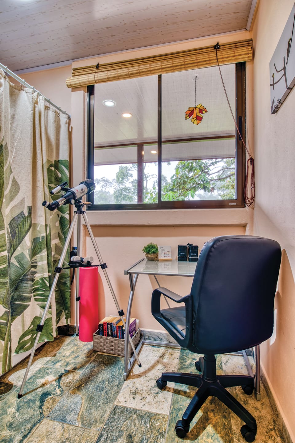 Dedicated workspace with laundry machines behind curtain