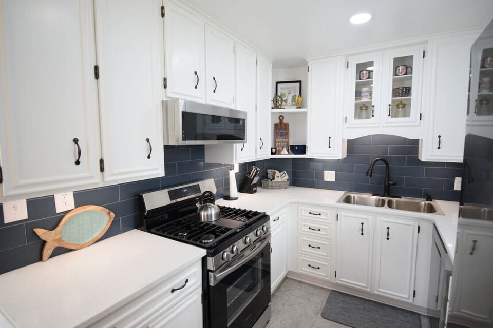 Fully stocked and renovated kitchen has everything you need for a wonderful family vacation.