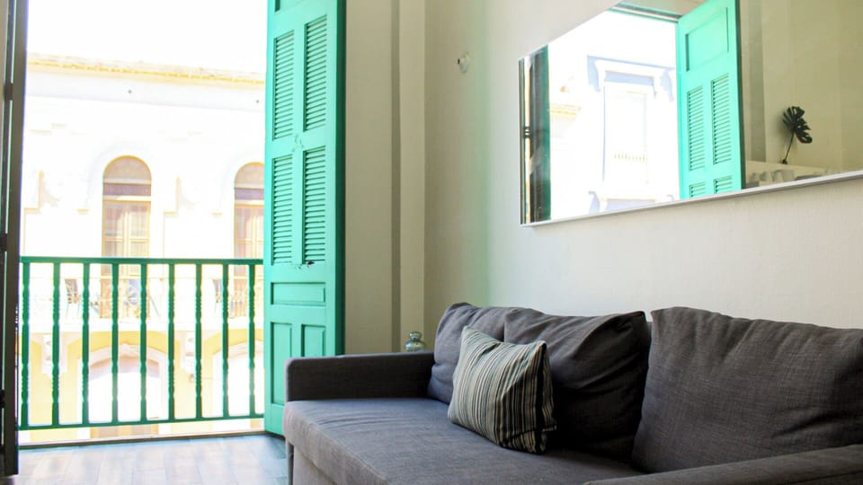 Basic Apartment | Living area | 30-inch Smart TV with digital channels, TV, streaming services