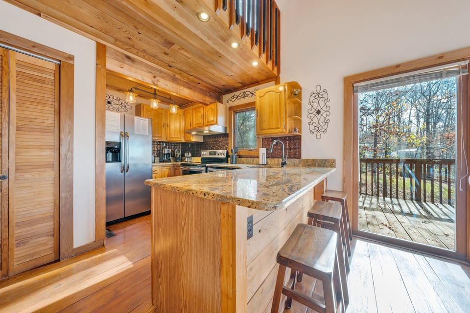 Granite countertops, and top quality appliances fill this kitchen for all of your needs during meal time.