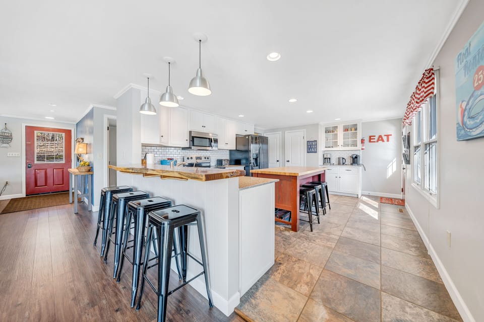 Spacious kitchen, granite countertops, and top quality appliances.