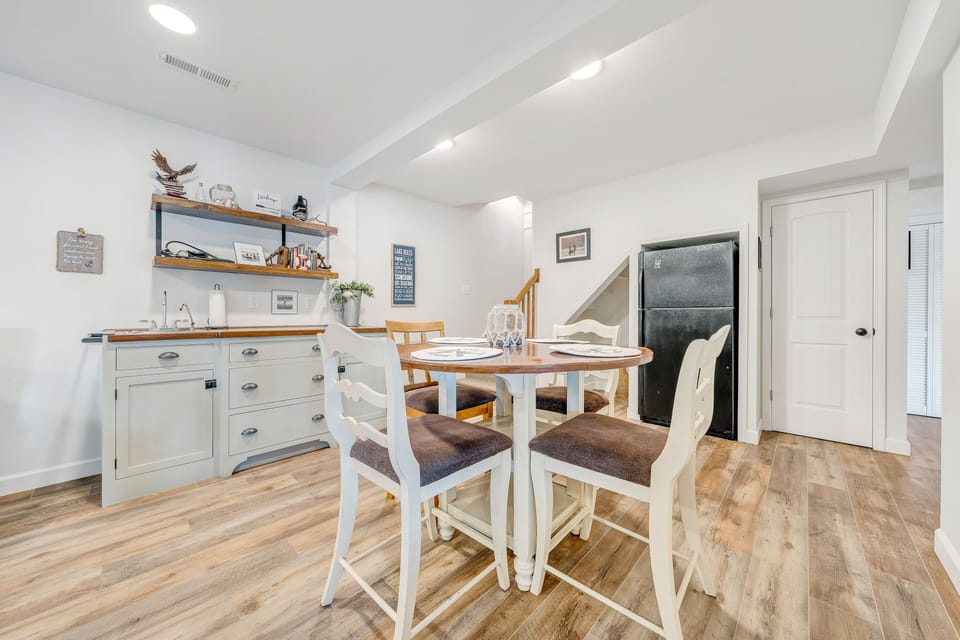 Lower level kitchenette with refrigerator for snack and beverage convenience.